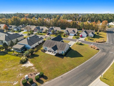 Beautiful 4 bedroom, 3 bath home with a courtyard garage entry on Crow Creek Golf Club in North Carolina - for sale on GolfHomes.com, golf home, golf lot