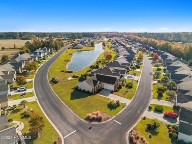 Beautiful 4 bedroom, 3 bath home with a courtyard garage entry on Crow Creek Golf Club in North Carolina - for sale on GolfHomes.com, golf home, golf lot