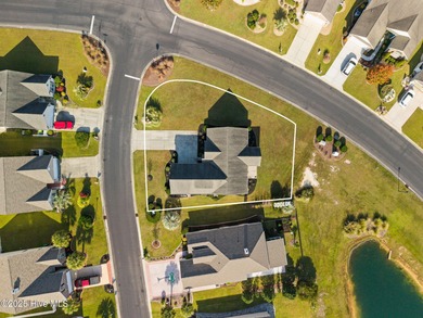 Beautiful 4 bedroom, 3 bath home with a courtyard garage entry on Crow Creek Golf Club in North Carolina - for sale on GolfHomes.com, golf home, golf lot