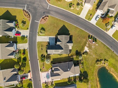 Beautiful 4 bedroom, 3 bath home with a courtyard garage entry on Crow Creek Golf Club in North Carolina - for sale on GolfHomes.com, golf home, golf lot