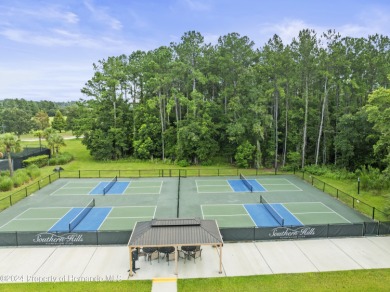 This gorgeous semi-custom home by Spire Homes includes the on Southern Hills Plantation Club in Florida - for sale on GolfHomes.com, golf home, golf lot