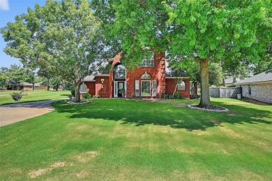 Location, location, location! This custom two-story brick home on Lake Kiowa Golf Course in Texas - for sale on GolfHomes.com, golf home, golf lot