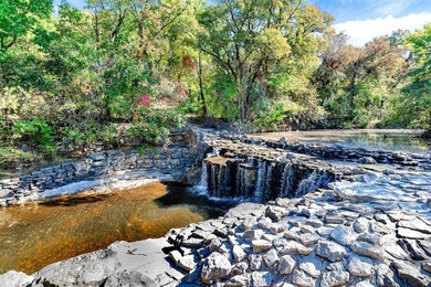 Situated just steps from the tranquil Prairie Creek Park and its on Canyon Creek Country Club in Texas - for sale on GolfHomes.com, golf home, golf lot