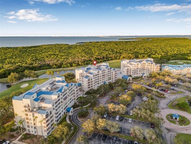 Welcome to Crystal Bay in Feather Sound --a resort-style on Feather Sound Country Club in Florida - for sale on GolfHomes.com, golf home, golf lot