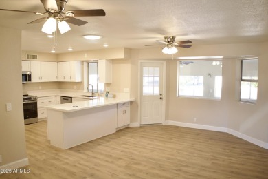 Beautifully remodeled home in a desirable 55+ community! This on Sunland Village East Golf Course in Arizona - for sale on GolfHomes.com, golf home, golf lot