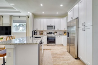 Welcome to this beautifully remodeled turnkey home where on Rotonda Golf and Country Club The Palms Course in Florida - for sale on GolfHomes.com, golf home, golf lot