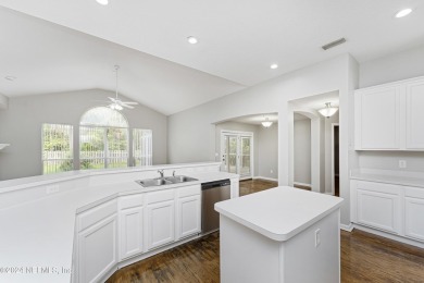 This home offers a formal living or flex space & a formal dining on Julington Creek Golf Club in Florida - for sale on GolfHomes.com, golf home, golf lot