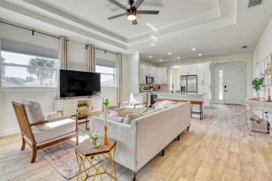 Welcome to this beautifully remodeled turnkey home where on Rotonda Golf and Country Club The Palms Course in Florida - for sale on GolfHomes.com, golf home, golf lot