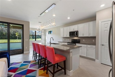 This partially FURNISHED, FIRST FLOOR carriage home is located on Panther Run Golf Club in Florida - for sale on GolfHomes.com, golf home, golf lot