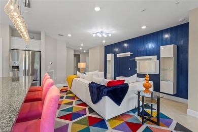 This partially FURNISHED, FIRST FLOOR carriage home is located on Panther Run Golf Club in Florida - for sale on GolfHomes.com, golf home, golf lot