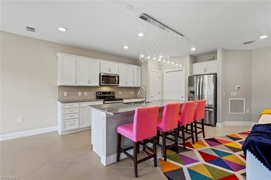 This partially FURNISHED, FIRST FLOOR carriage home is located on Panther Run Golf Club in Florida - for sale on GolfHomes.com, golf home, golf lot