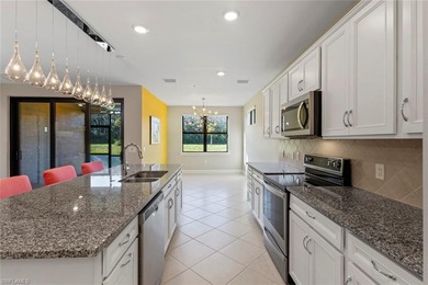 This partially FURNISHED, FIRST FLOOR carriage home is located on Panther Run Golf Club in Florida - for sale on GolfHomes.com, golf home, golf lot