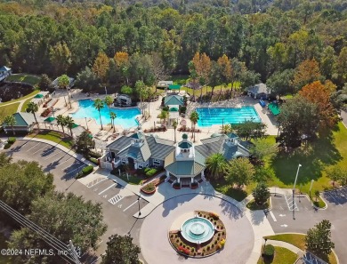 This home offers a formal living or flex space & a formal dining on Julington Creek Golf Club in Florida - for sale on GolfHomes.com, golf home, golf lot