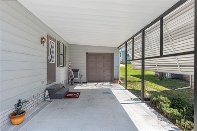 Welcome to this COMPLETELY UPDATED home in Orange Blossom, The on El Diablo Executive Golf Course in Florida - for sale on GolfHomes.com, golf home, golf lot