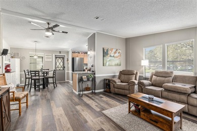 Welcome to this COMPLETELY UPDATED home in Orange Blossom, The on El Diablo Executive Golf Course in Florida - for sale on GolfHomes.com, golf home, golf lot