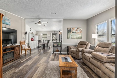 Welcome to this COMPLETELY UPDATED home in Orange Blossom, The on El Diablo Executive Golf Course in Florida - for sale on GolfHomes.com, golf home, golf lot