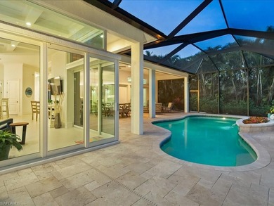 Gracefully positioned on an exceptionally private preserve on Bay Colony Golf Club in Florida - for sale on GolfHomes.com, golf home, golf lot