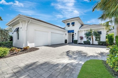Indulge in modern luxury at this exquisite STOCK LUXURY home in on The Golf Club At Fiddlers Creek in Florida - for sale on GolfHomes.com, golf home, golf lot