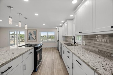 Nestled within a secure, pet-friendly waterfront community on Pelicans Nest Golf Club in Florida - for sale on GolfHomes.com, golf home, golf lot