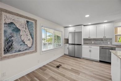 Nestled within a secure, pet-friendly waterfront community on Pelicans Nest Golf Club in Florida - for sale on GolfHomes.com, golf home, golf lot