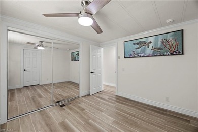 Nestled within a secure, pet-friendly waterfront community on Pelicans Nest Golf Club in Florida - for sale on GolfHomes.com, golf home, golf lot