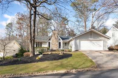 Set on a quiet street in the sought-after Horseshoe Bend on Horseshoe Bend Country Club in Georgia - for sale on GolfHomes.com, golf home, golf lot