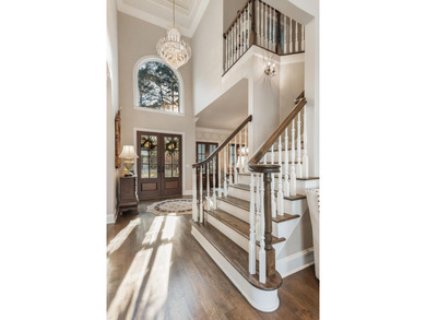 EXTRAORDINARY LAKEFRONT HOME IN GREAT WATERS, WITH EXPANSIVE on Great Waters Course At Reynolds Plantation in Georgia - for sale on GolfHomes.com, golf home, golf lot