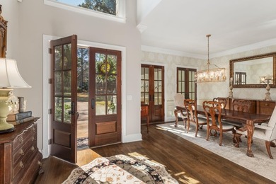 EXTRAORDINARY LAKEFRONT HOME IN GREAT WATERS, WITH EXPANSIVE on Great Waters Course At Reynolds Plantation in Georgia - for sale on GolfHomes.com, golf home, golf lot