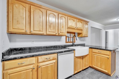 Welcome to this spacious 4-bedroom, 2-bath home in the highly on The International City Golf Course in Georgia - for sale on GolfHomes.com, golf home, golf lot