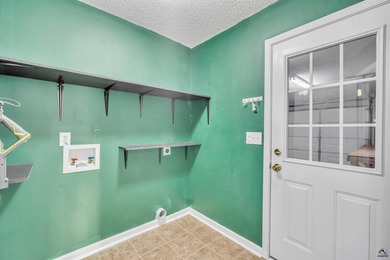 Welcome to this spacious 4-bedroom, 2-bath home in the highly on The International City Golf Course in Georgia - for sale on GolfHomes.com, golf home, golf lot