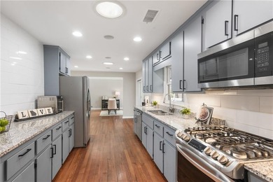 Set on a quiet street in the sought-after Horseshoe Bend on Horseshoe Bend Country Club in Georgia - for sale on GolfHomes.com, golf home, golf lot