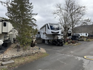 Beautifully landscaped LAKEFRONT RV lot in the sought after on Bent Creek Golf Course in Tennessee - for sale on GolfHomes.com, golf home, golf lot