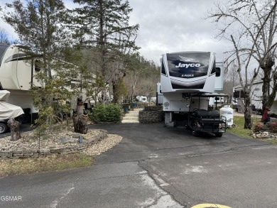 Beautifully landscaped LAKEFRONT RV lot in the sought after on Bent Creek Golf Course in Tennessee - for sale on GolfHomes.com, golf home, golf lot