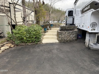 Beautifully landscaped LAKEFRONT RV lot in the sought after on Bent Creek Golf Course in Tennessee - for sale on GolfHomes.com, golf home, golf lot