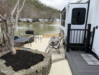 Beautifully landscaped LAKEFRONT RV lot in the sought after on Bent Creek Golf Course in Tennessee - for sale on GolfHomes.com, golf home, golf lot