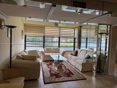 This spacious 2-bedroom, 2-bath Whitehall condo is located in on Pine Island Ridge Country Club in Florida - for sale on GolfHomes.com, golf home, golf lot