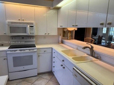 This spacious 2-bedroom, 2-bath Whitehall condo is located in on Pine Island Ridge Country Club in Florida - for sale on GolfHomes.com, golf home, golf lot