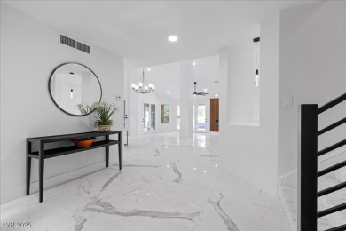 Experience ultimate luxury in this stunning Spanish Trail villa on Spanish Trail Golf and Country Club in Nevada - for sale on GolfHomes.com, golf home, golf lot