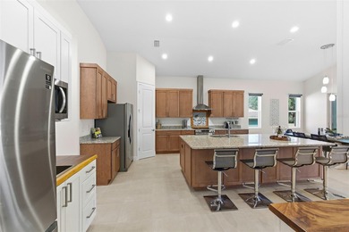 Welcome Home to luxury living in the double-gated Bella Vista on Harbor Hills Country Club in Florida - for sale on GolfHomes.com, golf home, golf lot