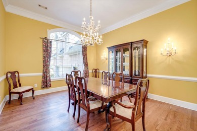 Located in an exclusive gated community this beautiful custom on The Reserve Club At Woodside Plantation in South Carolina - for sale on GolfHomes.com, golf home, golf lot