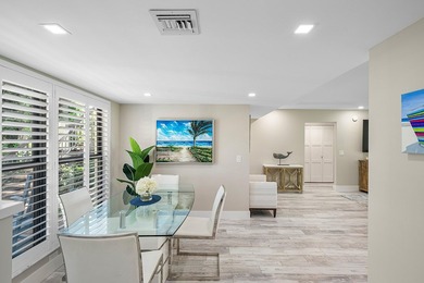 Welcome to this inviting 1stfloor home showcasing serene golf on Quail Ridge Golf Course and Country Club in Florida - for sale on GolfHomes.com, golf home, golf lot