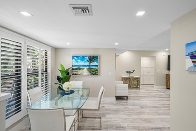 Welcome to this inviting 1st‑floor home showcasing serene on Quail Ridge Golf Course and Country Club in Florida - for sale on GolfHomes.com, golf home, golf lot