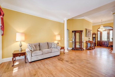 Located in an exclusive gated community this beautiful custom on The Reserve Club At Woodside Plantation in South Carolina - for sale on GolfHomes.com, golf home, golf lot