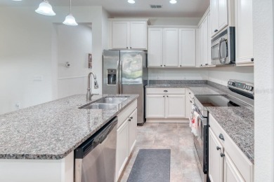 Move-in ready Avellino model, featuring a Courtyard entry to on Stonegate Golf Club in Florida - for sale on GolfHomes.com, golf home, golf lot