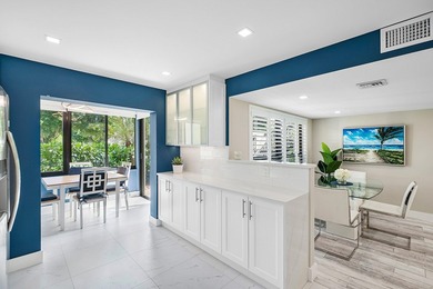 Welcome to this inviting 1stfloor home showcasing serene golf on Quail Ridge Golf Course and Country Club in Florida - for sale on GolfHomes.com, golf home, golf lot