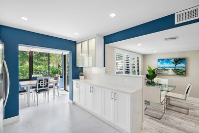 Welcome to this inviting 1st‑floor home showcasing serene on Quail Ridge Golf Course and Country Club in Florida - for sale on GolfHomes.com, golf home, golf lot