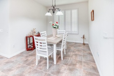 Move-in ready Avellino model, featuring a Courtyard entry to on Stonegate Golf Club in Florida - for sale on GolfHomes.com, golf home, golf lot