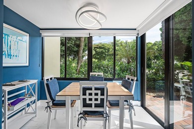 Welcome to this inviting 1stfloor home showcasing serene golf on Quail Ridge Golf Course and Country Club in Florida - for sale on GolfHomes.com, golf home, golf lot