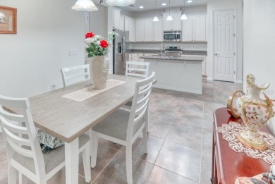 Move-in ready Avellino model, featuring a Courtyard entry to on Stonegate Golf Club in Florida - for sale on GolfHomes.com, golf home, golf lot