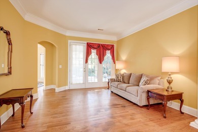 Located in an exclusive gated community this beautiful custom on The Reserve Club At Woodside Plantation in South Carolina - for sale on GolfHomes.com, golf home, golf lot